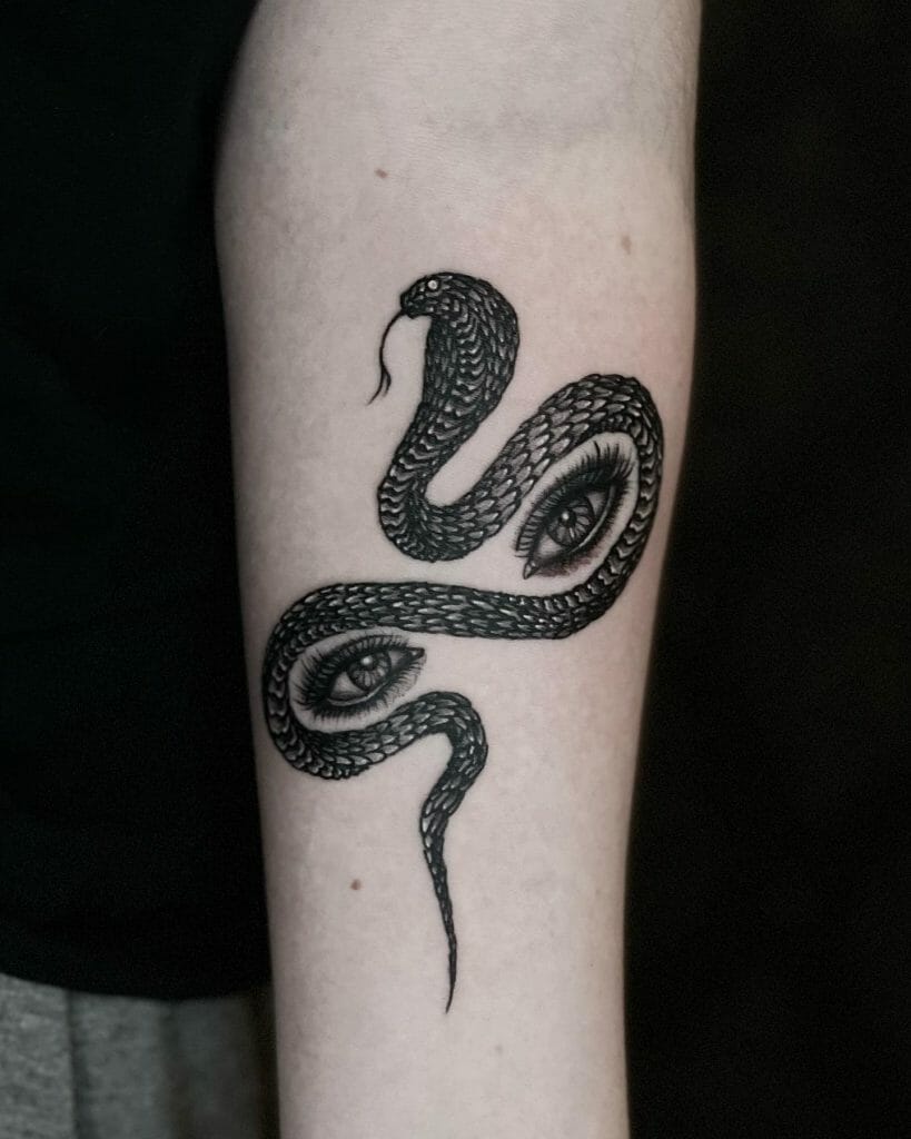 Best Snake Eyes Tattoos Done In Blackwork Style
