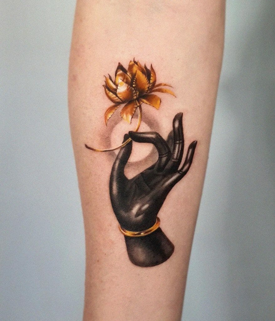 Buddha Hand With Golden Lotus Tattoo