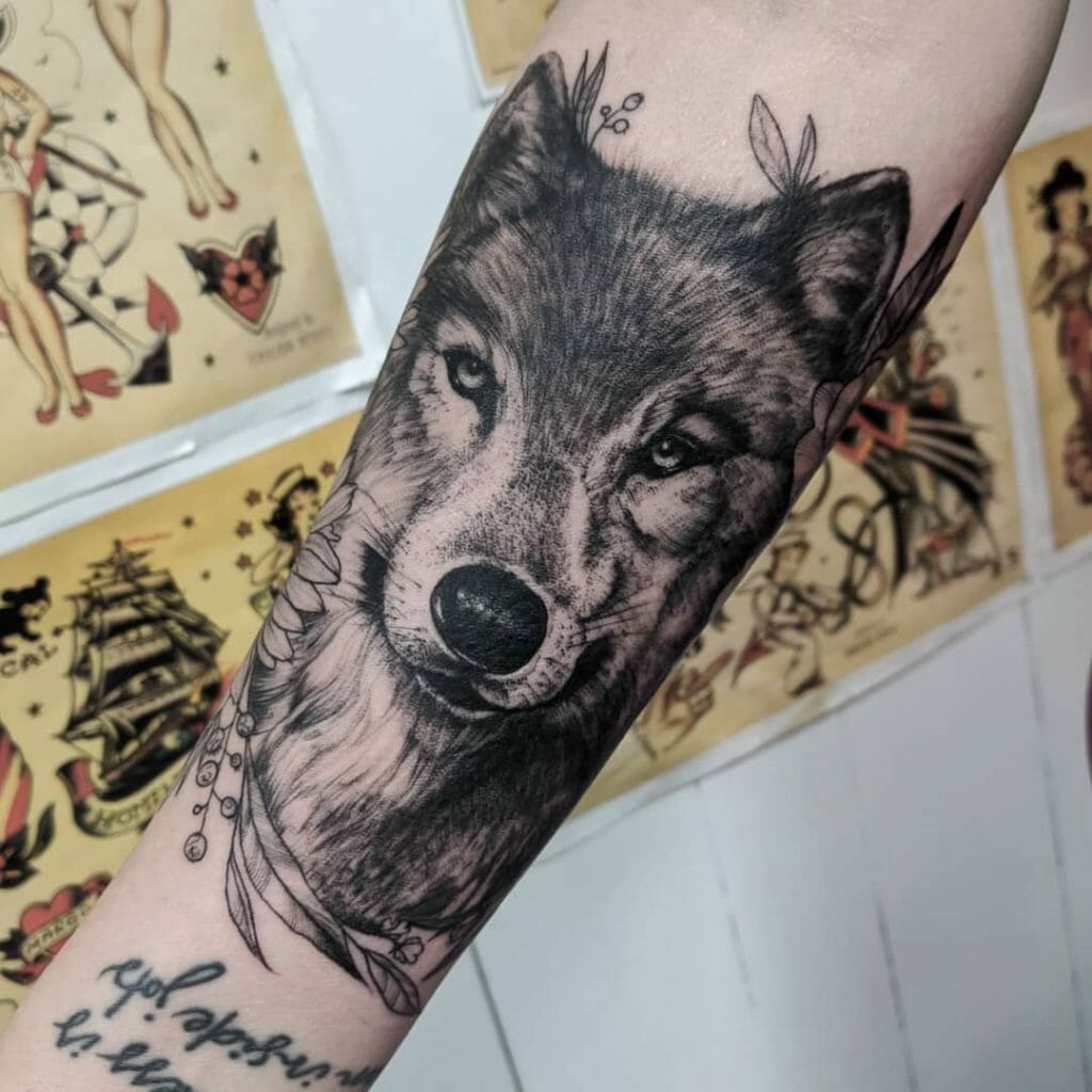 Calm Wolf And Flower Tattoo