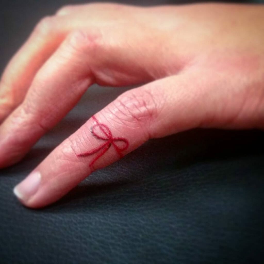 Classic Red String Tattoo