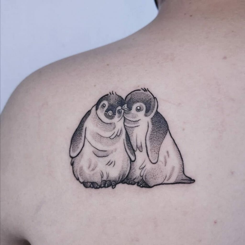 Cute Penguin Tattoo On Shoulder Blade