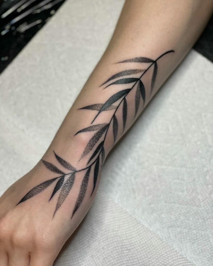 Delicate Vine On Wrist Tattoo