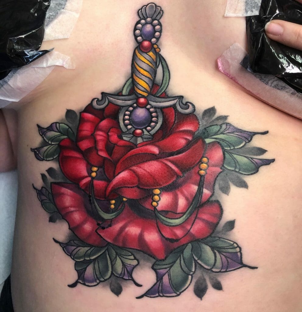 Elaborate Rose And Dagger Tattoo Design