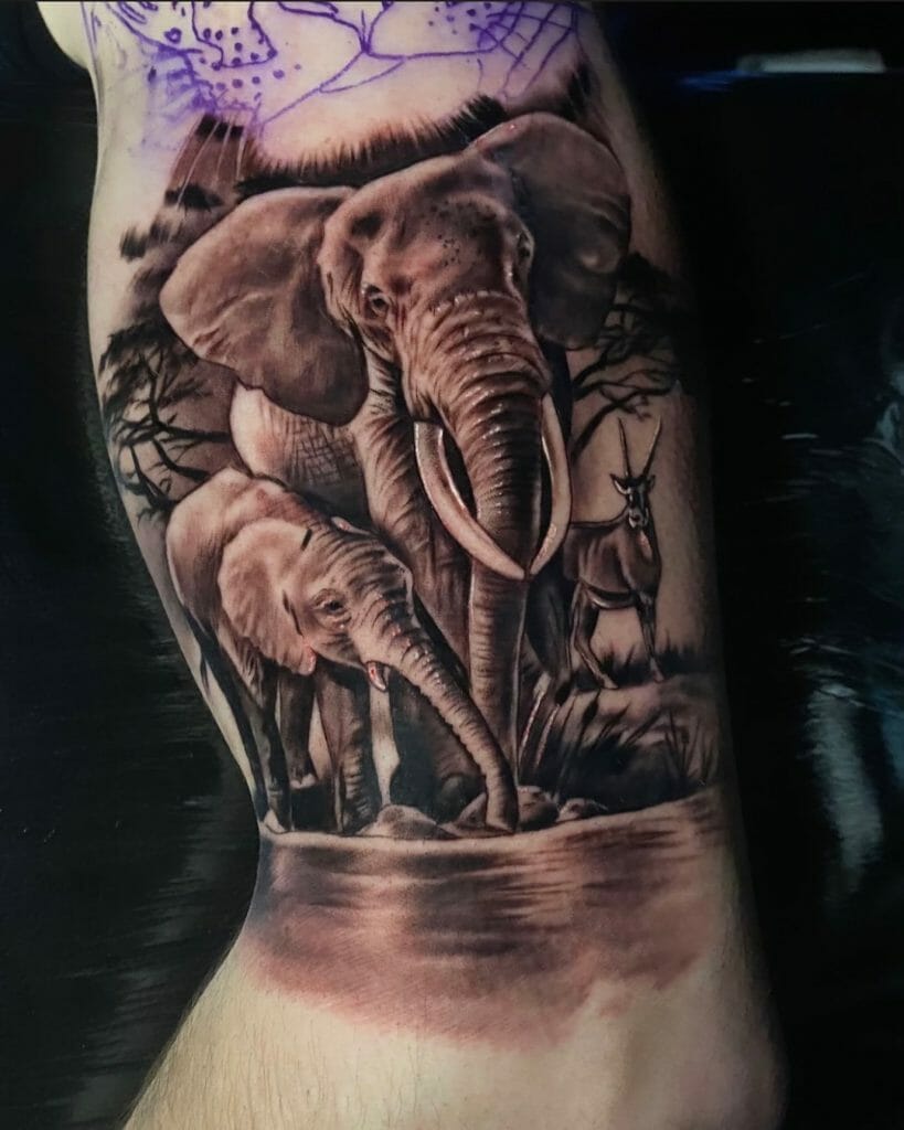Elephant Tattoo With A Baby Elephant And A Deer