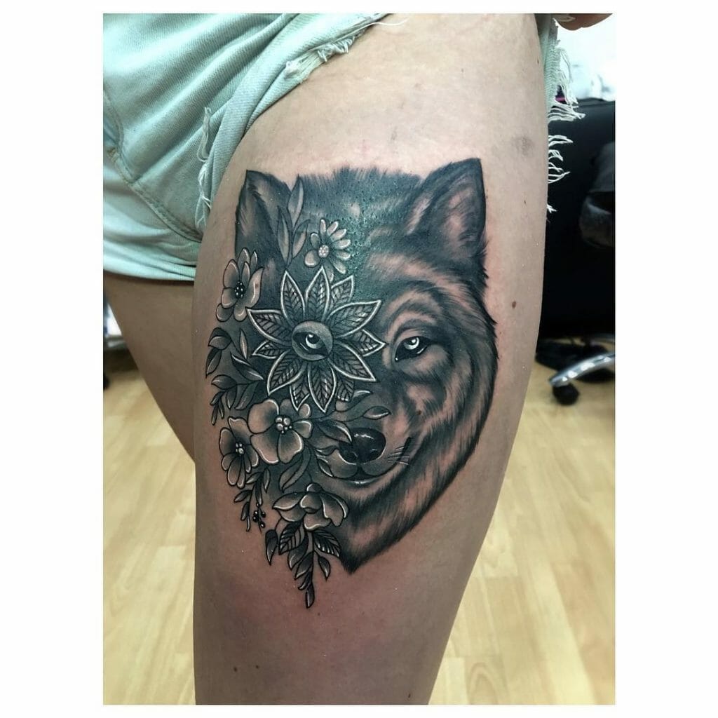 Flower In The Eye Wolf Tattoo