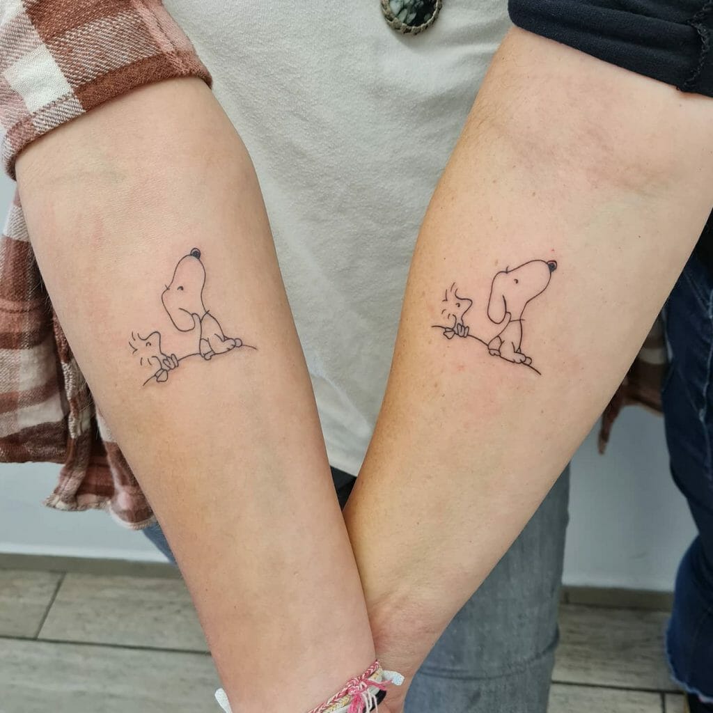 His n Her Matching Snoopy and Woodstock Tattoo