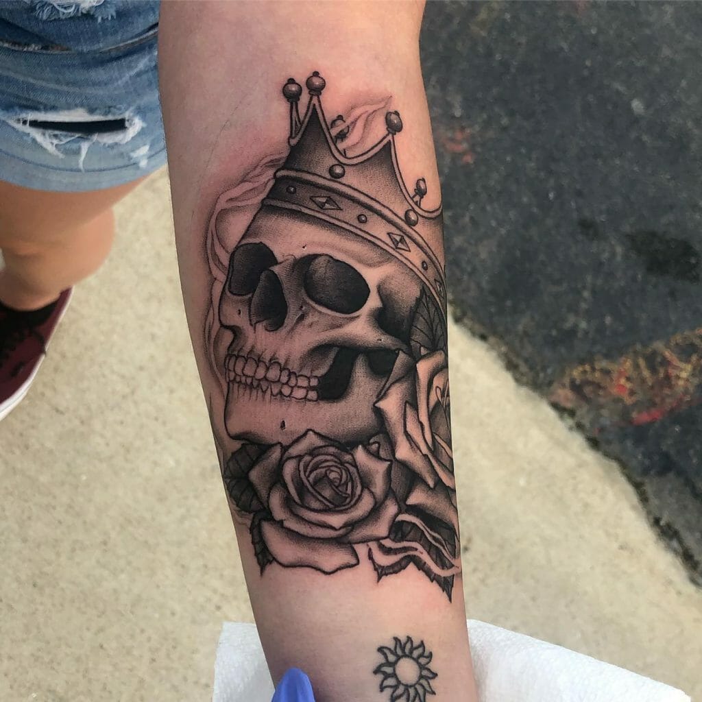 Hyper-realistic Skulls And Crown Tattoo With Roses