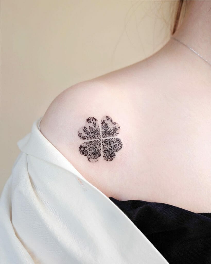 Intricate Black Ink Four Leaf Clover Tattoo for Women