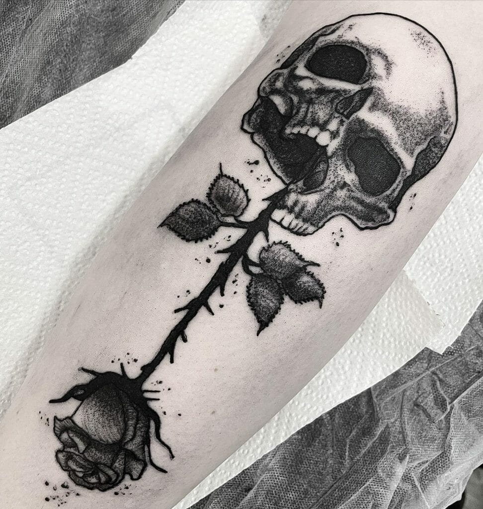 Inverted Rose Tattoos With Skull