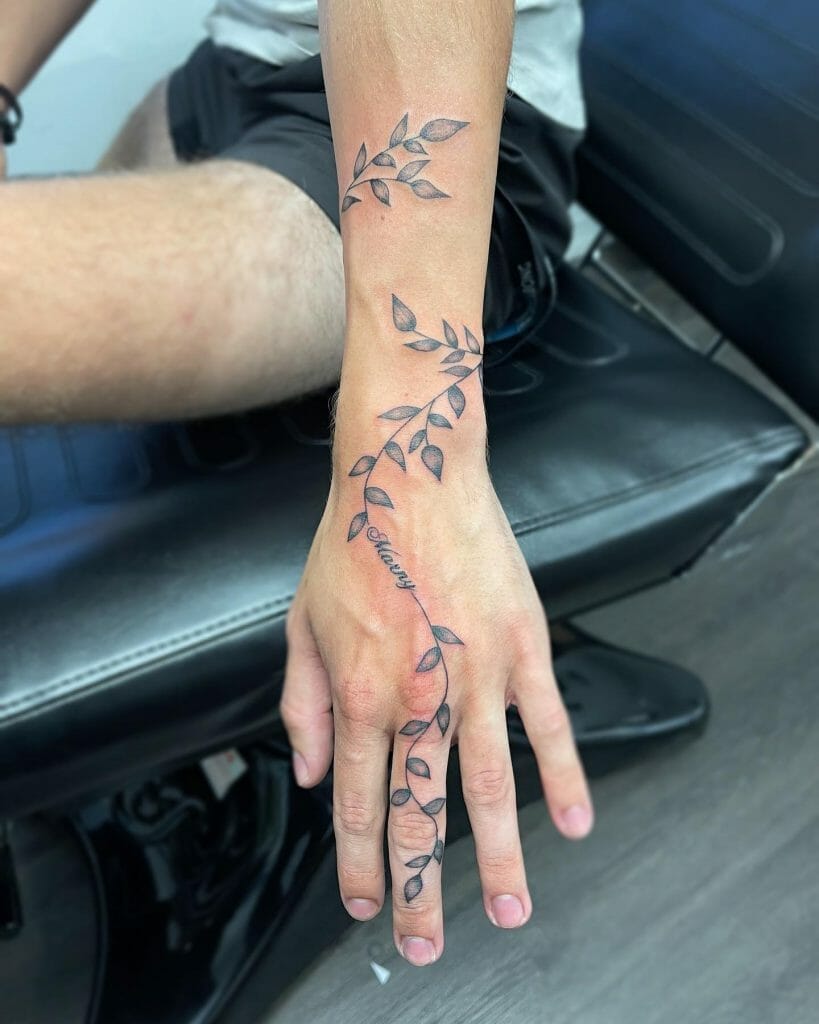 Leaf On Vines Around Wrist And Finger Tattoo
