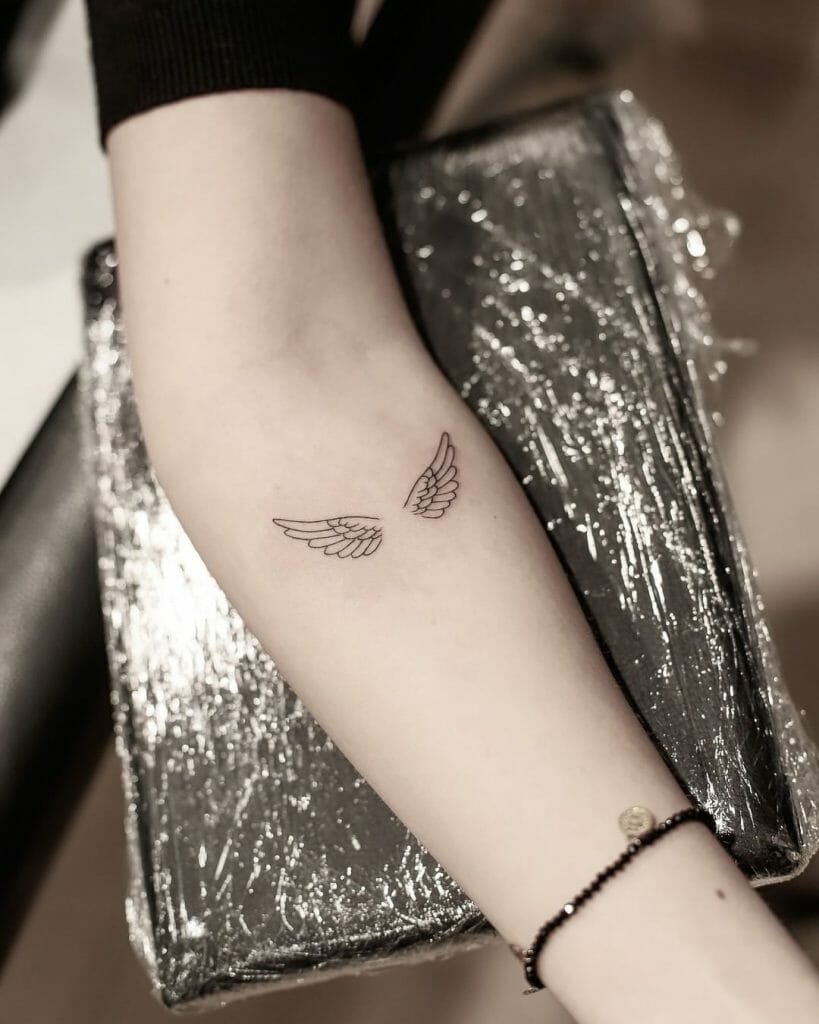 Minimalistic Angel Wings Tattoo