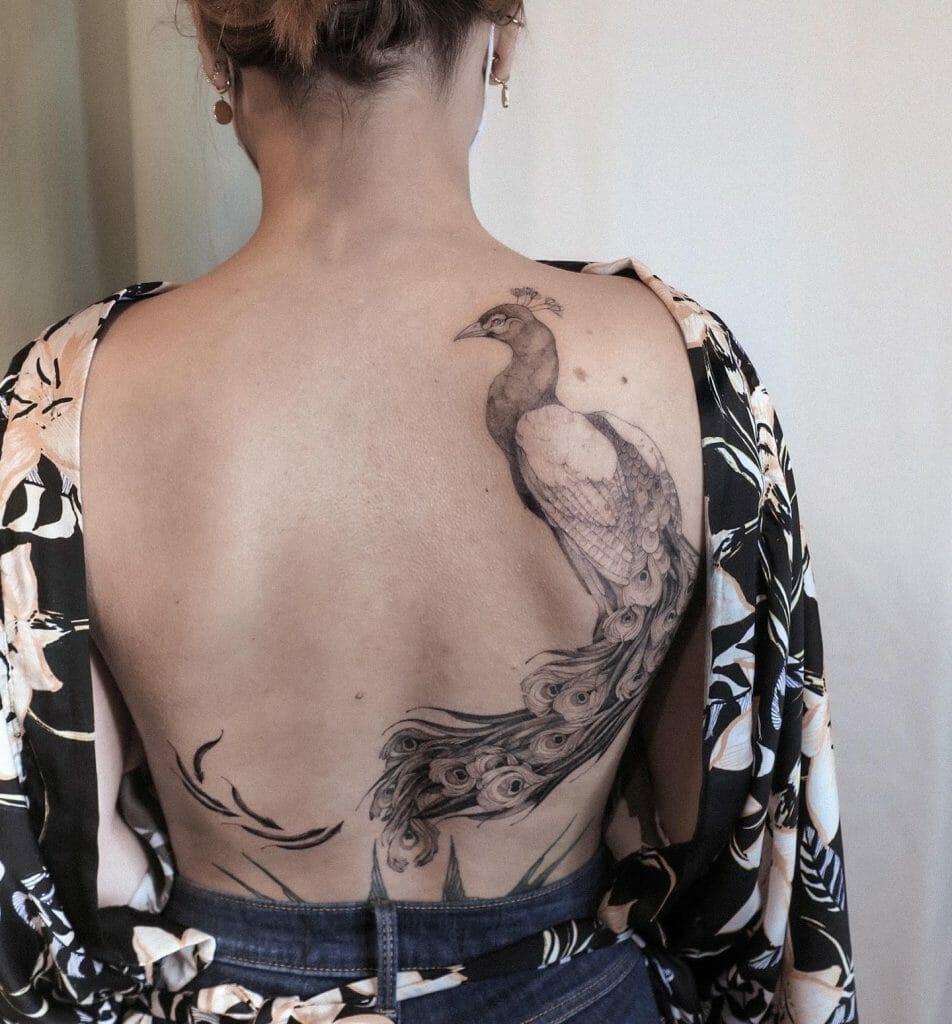 Minimalistic Black and White Peacock Back Tattoo