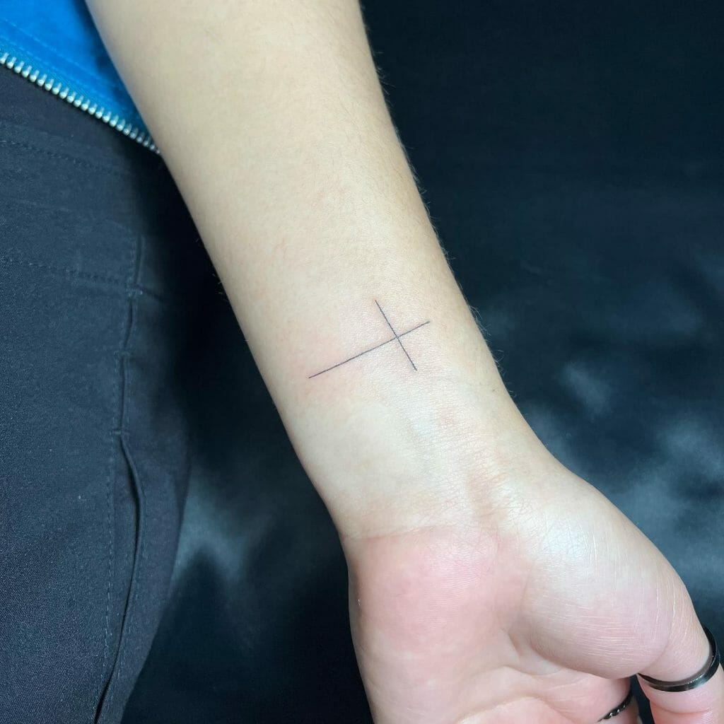 Minimalistic Cross Tattoo