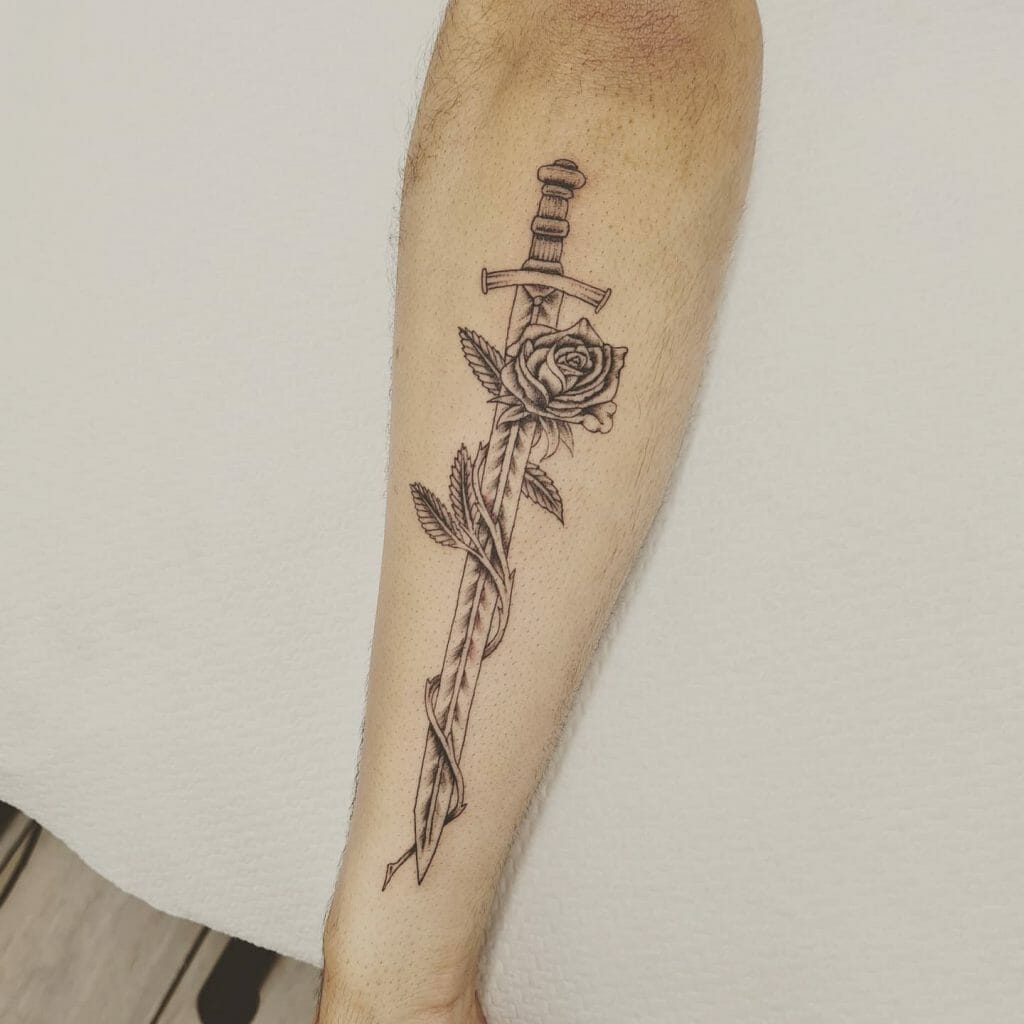 Monochromatic Sword And Rose Tattoo