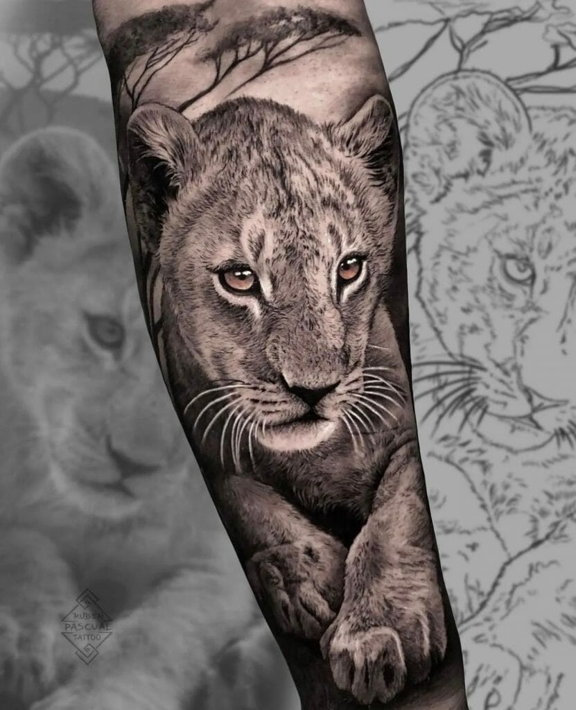 Realistic Black and Grey Lion Cub Tattoo