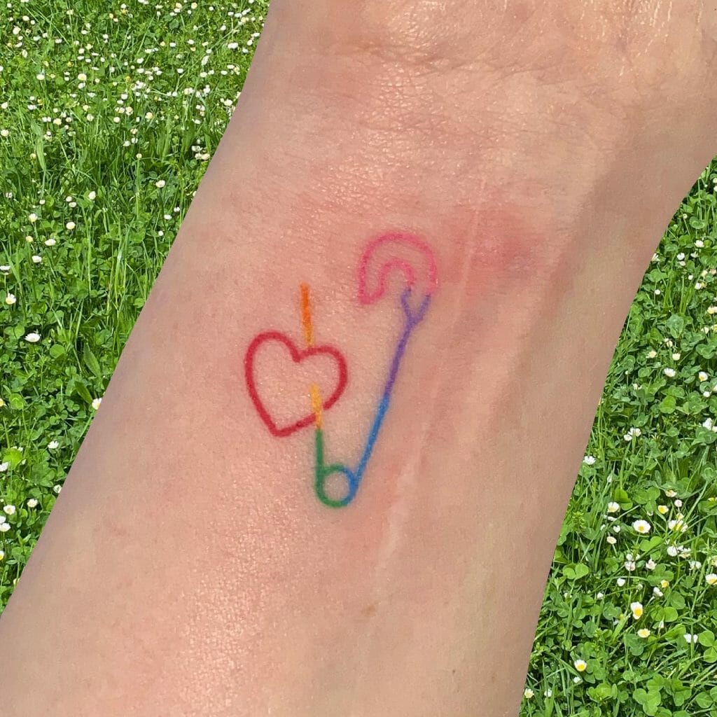 Safety Pin and Heart With Rainbow Colours Tattoo