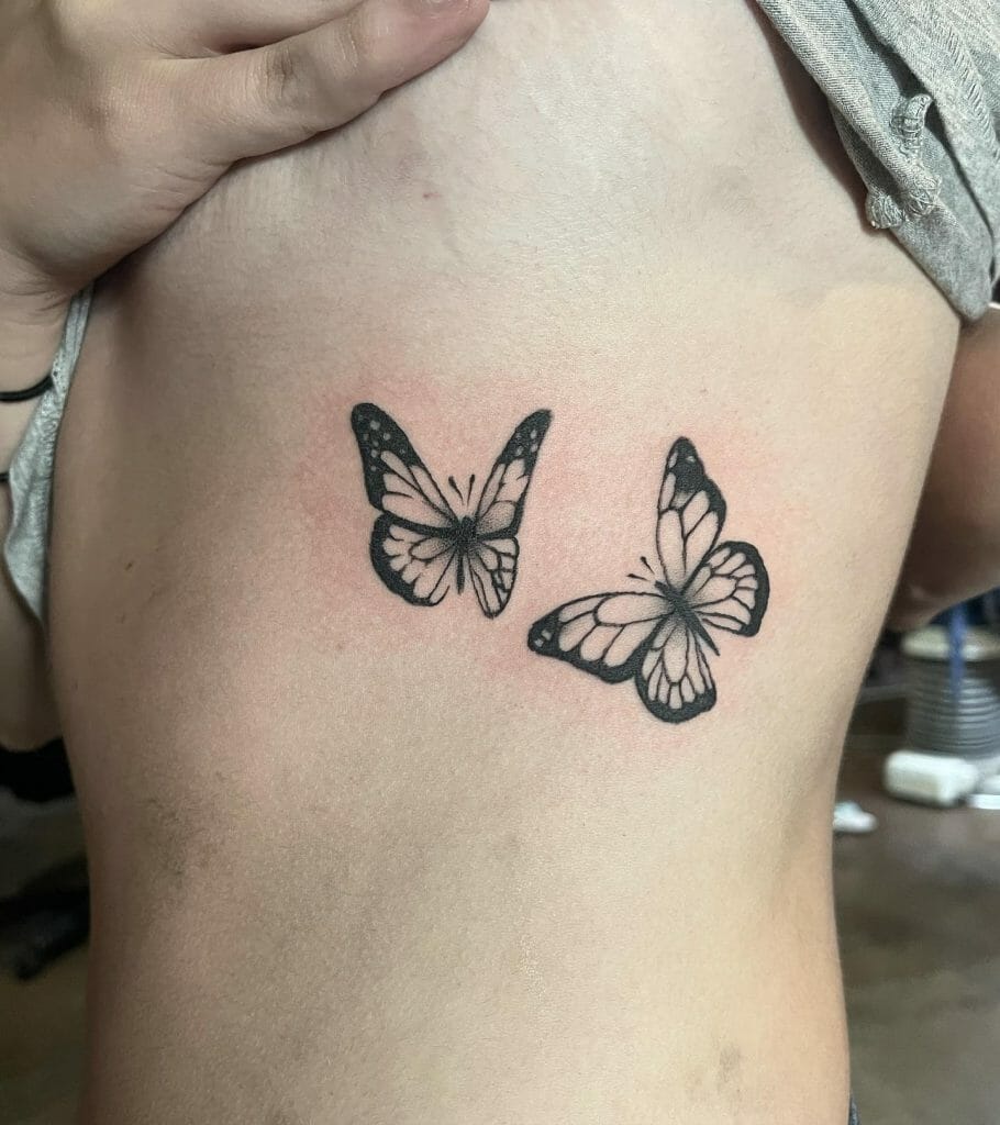 Simple And Minimal Rib Tattoos With Butterfly Motif