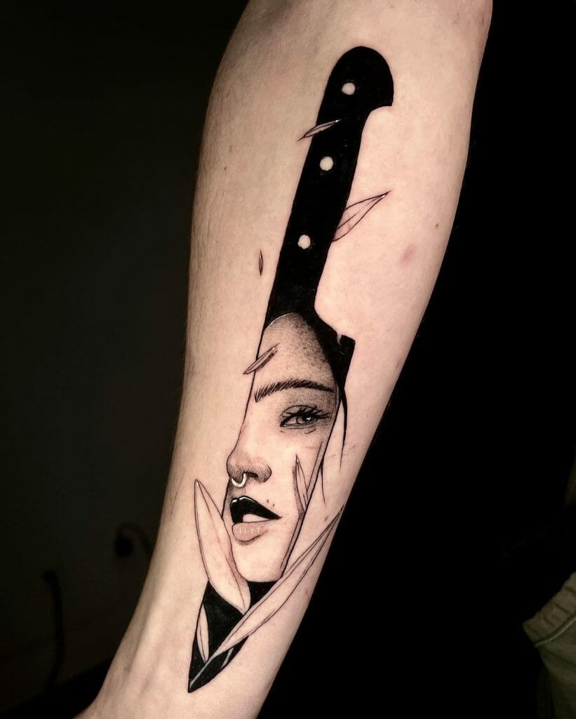 Simple Knife Tattoo With A Face Of A Girl