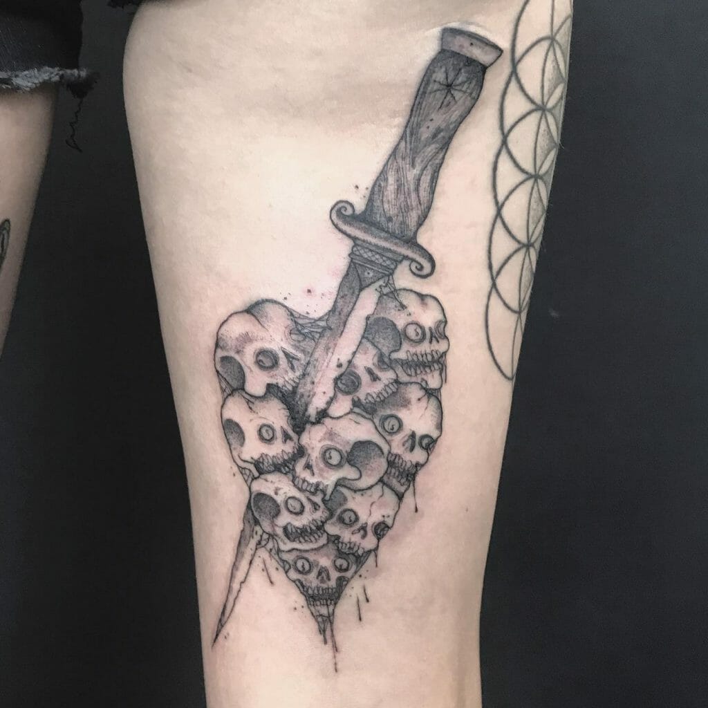 Simple Knife Through Heart Tattoo