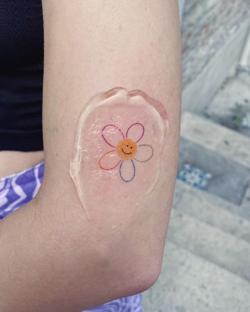 Simple Rainbow Flower Tattoo