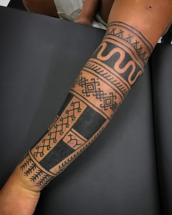 Simple Tribal Tattoo Arm 585x731 