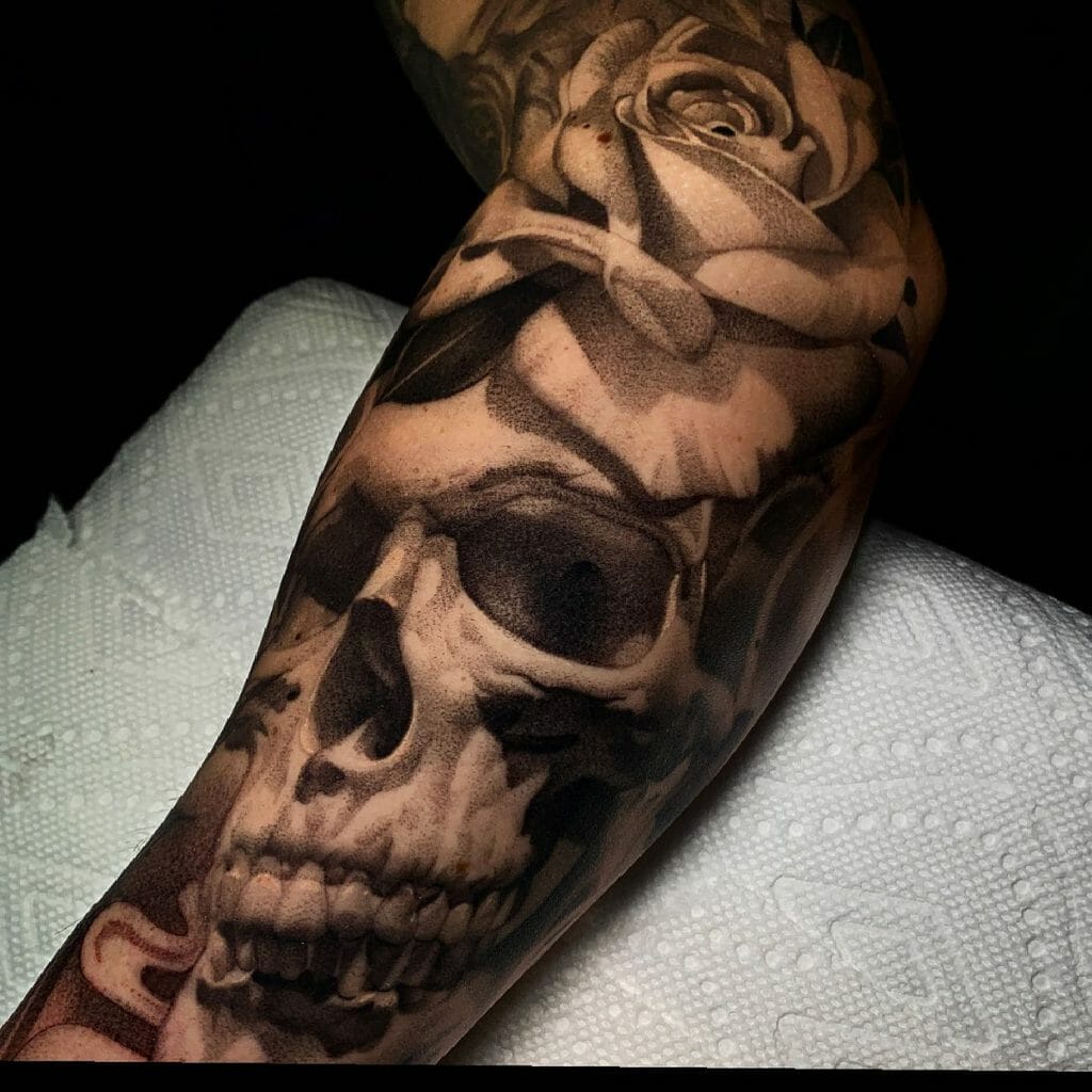 Skeleton and Rose Hand Tattoo