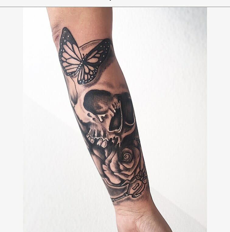 Skull And Roses Half Sleeve Tattoo With A Butterfly