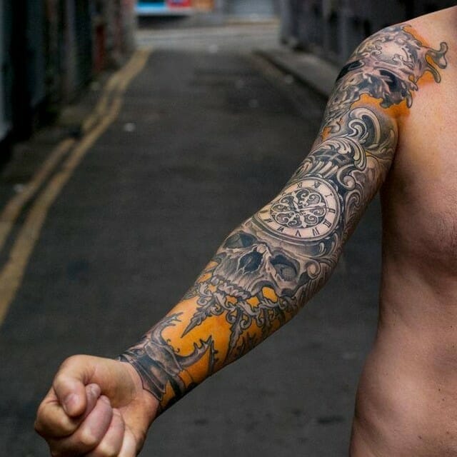 Skull Sleeve Tattoo With A Clock