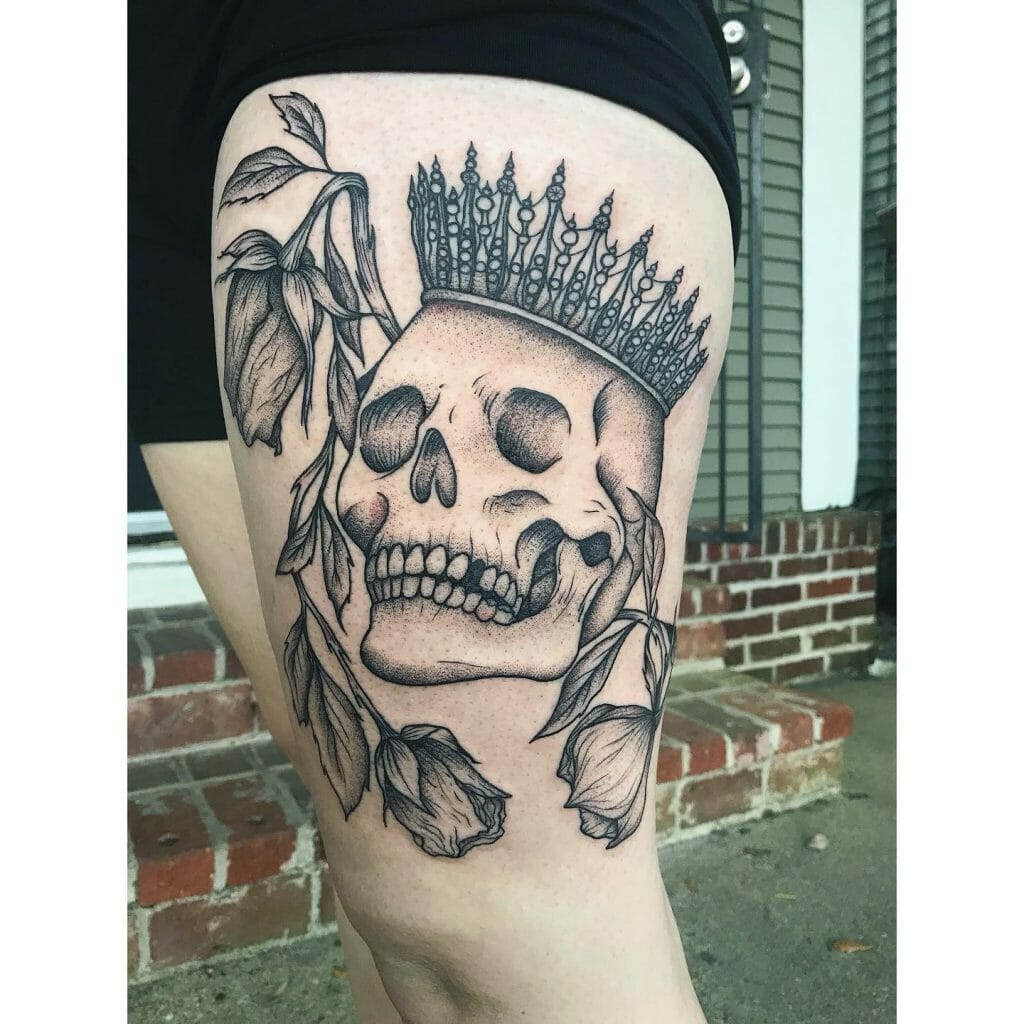 Skulls And Crown Tattoo With Flowers And Leaves