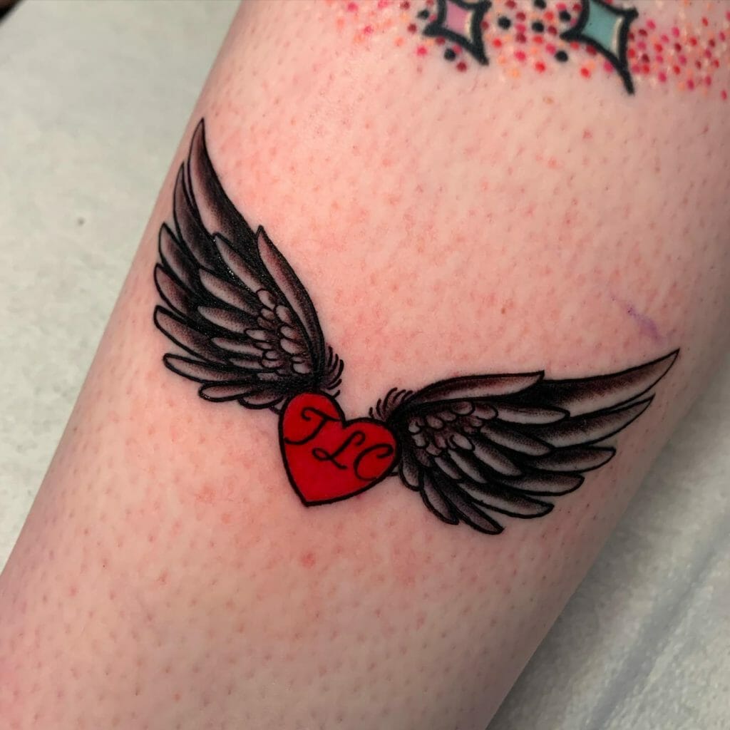 Learn 99+ about simple heart with wings tattoo best .vn