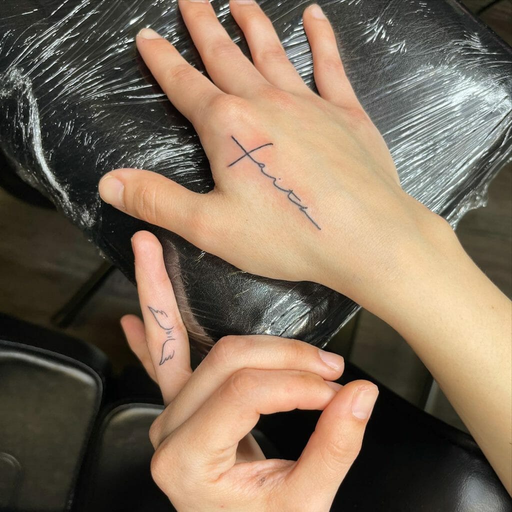 Small Cross Faith Tattoo on Hand