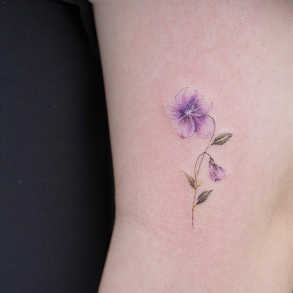 Small Purple Flower Tattoo