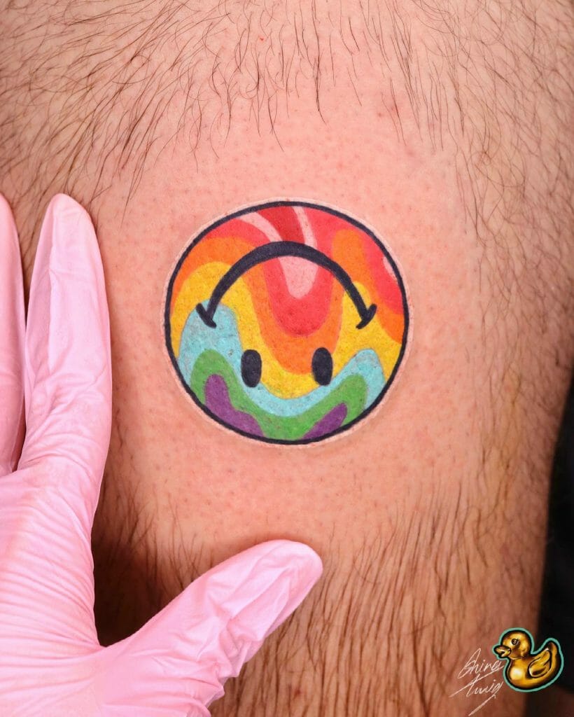 Smiley Face Tattoo In A Rainbow Colors