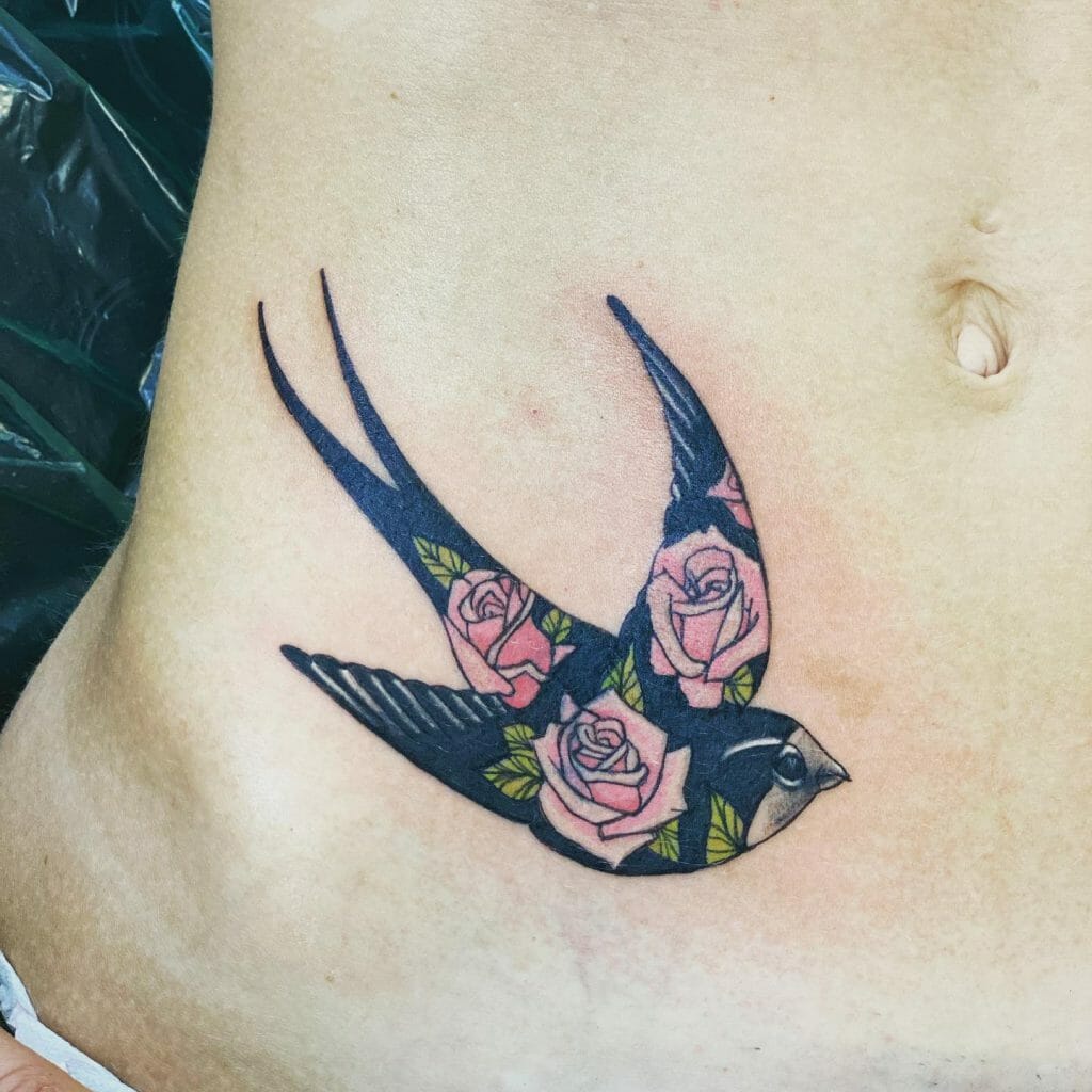 Swallow Tattoo With Floral Motifs