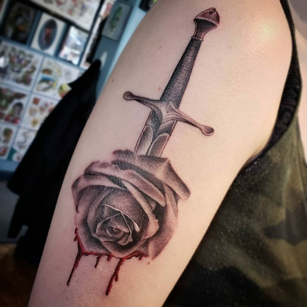 Sword And Bleeding Rose Tattoo