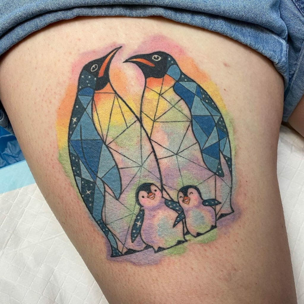 Tattoo Of A Family Of Four Penguins