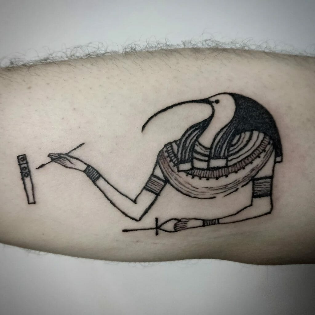 Tattoos Portraying Thoth While Writing