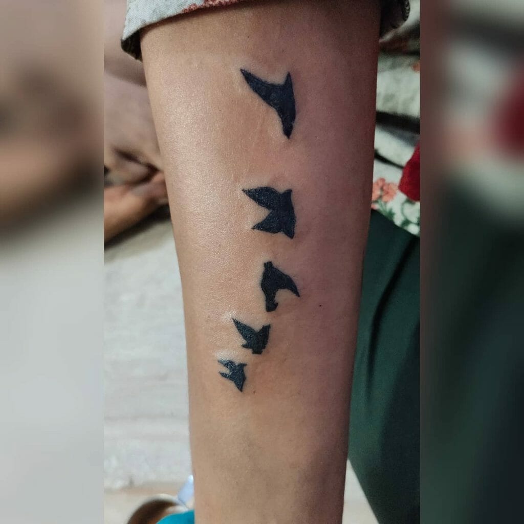 The Eye Catching Bird Hand Tattoo Designs