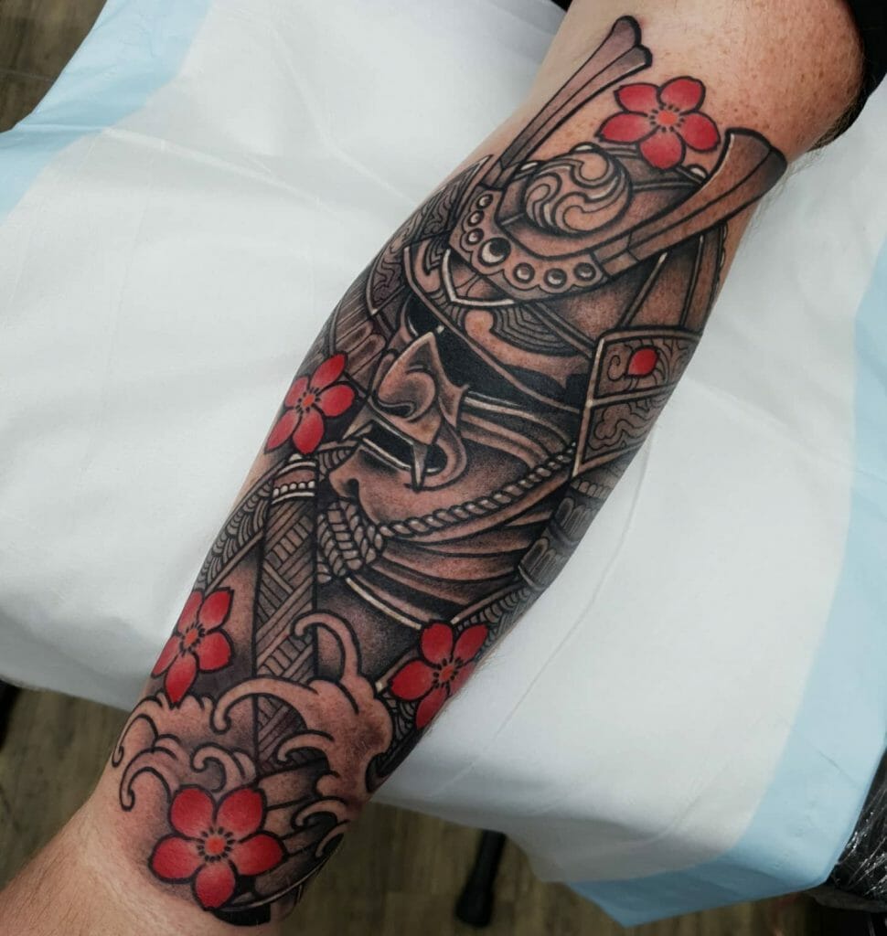 The Samurai Mask Tattoo with Red Flowers