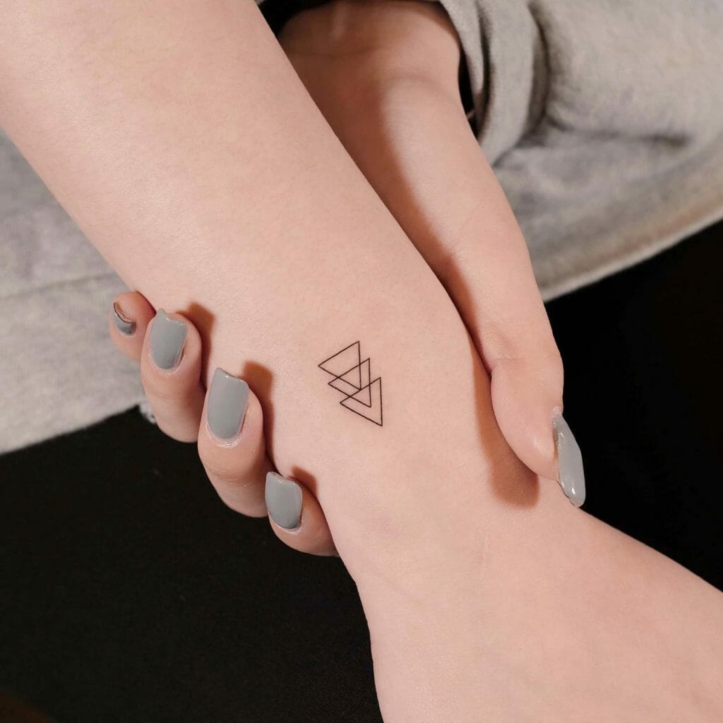 Three Interlocking Triangles Tattoo Design ideas