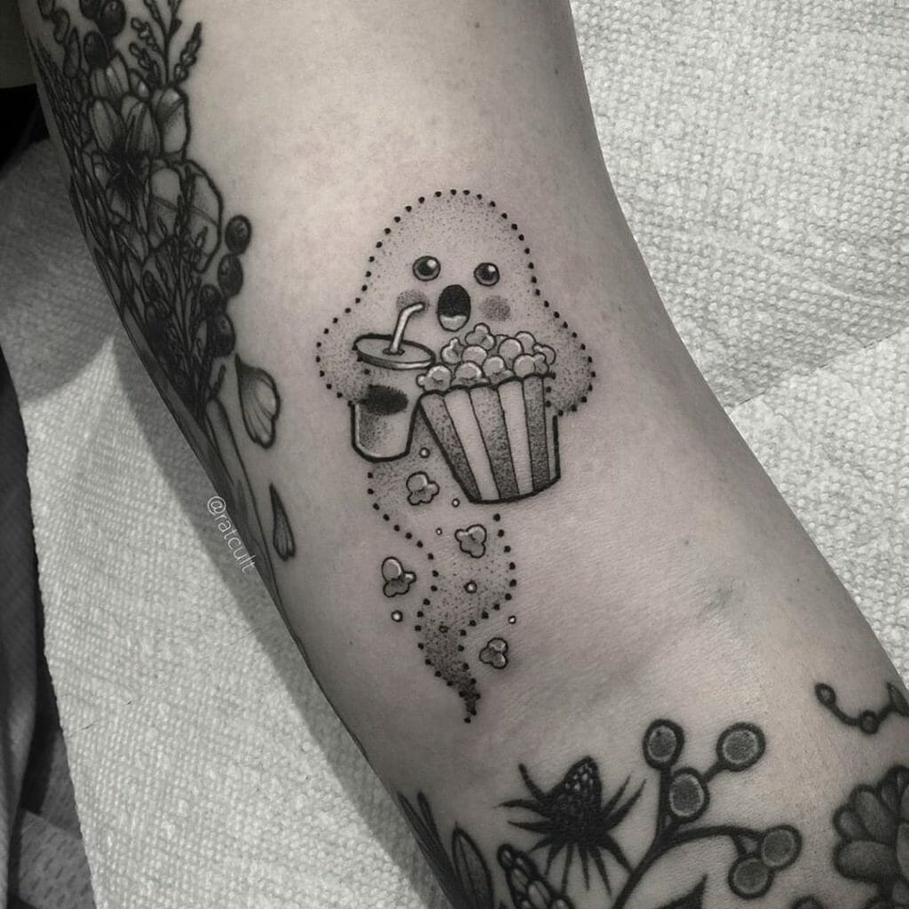 Tiny Ghost Eating Tattoo