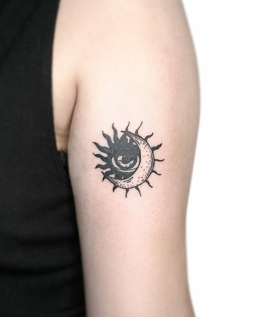 Tribal Sun and the Moon tattoo