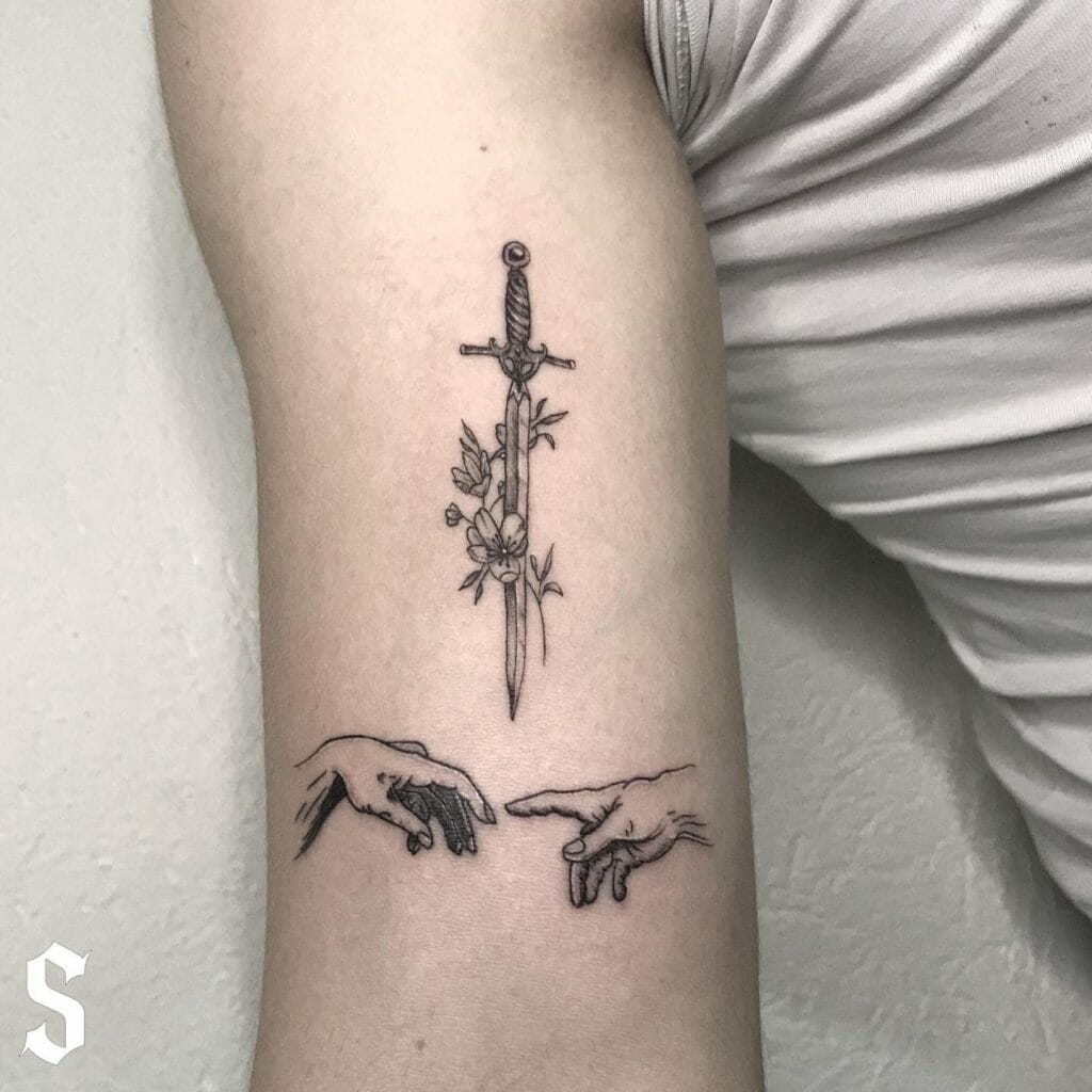 Unique Sword And Rose Tattoo