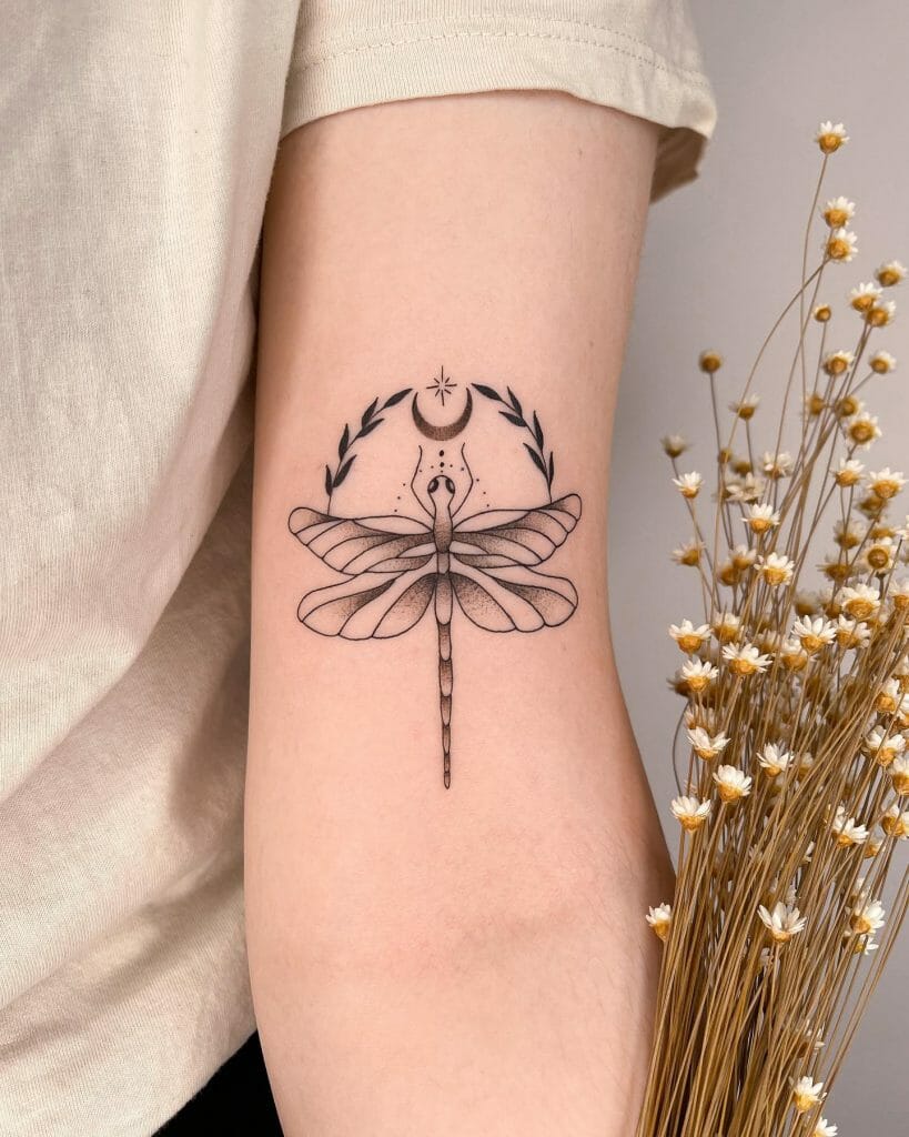 A Simple Dragonfly Hand Tattoo