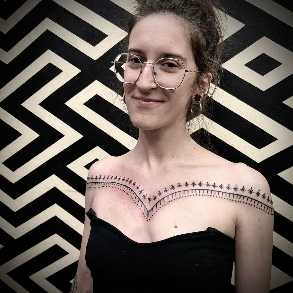 Amazing Chest Tattoo For Women In Ornamental Pattern