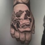 Best Mens Skull Hand Tattoo