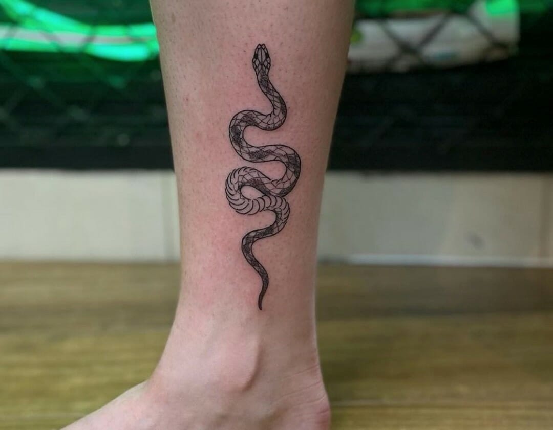 Healed snake tattoo on my friend snake goes around the ankle 2nd pic  fresh  rsticknpokes