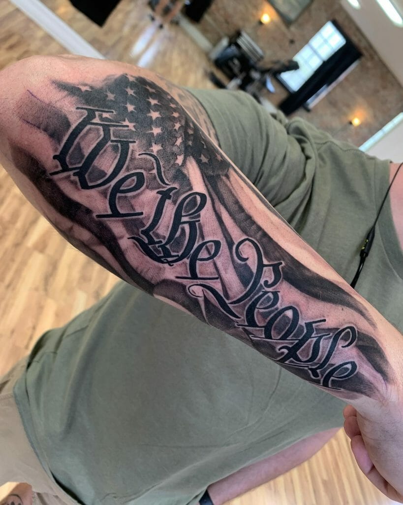 Black And Gray American Flag We The People Tattoo
