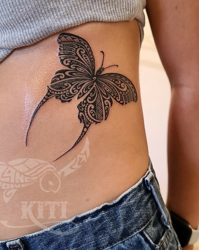 Black And Grey Tribal Butterfly Tattoo
