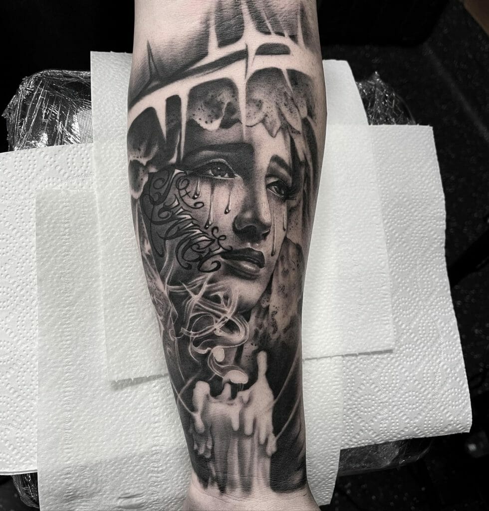 Black And Grey Virgin Mary Forearm Tattoo